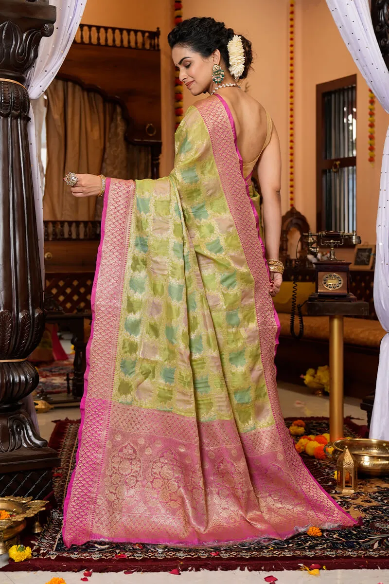 Opulent Mehndi Organza Silk Saree With Adoring Blouse Piece