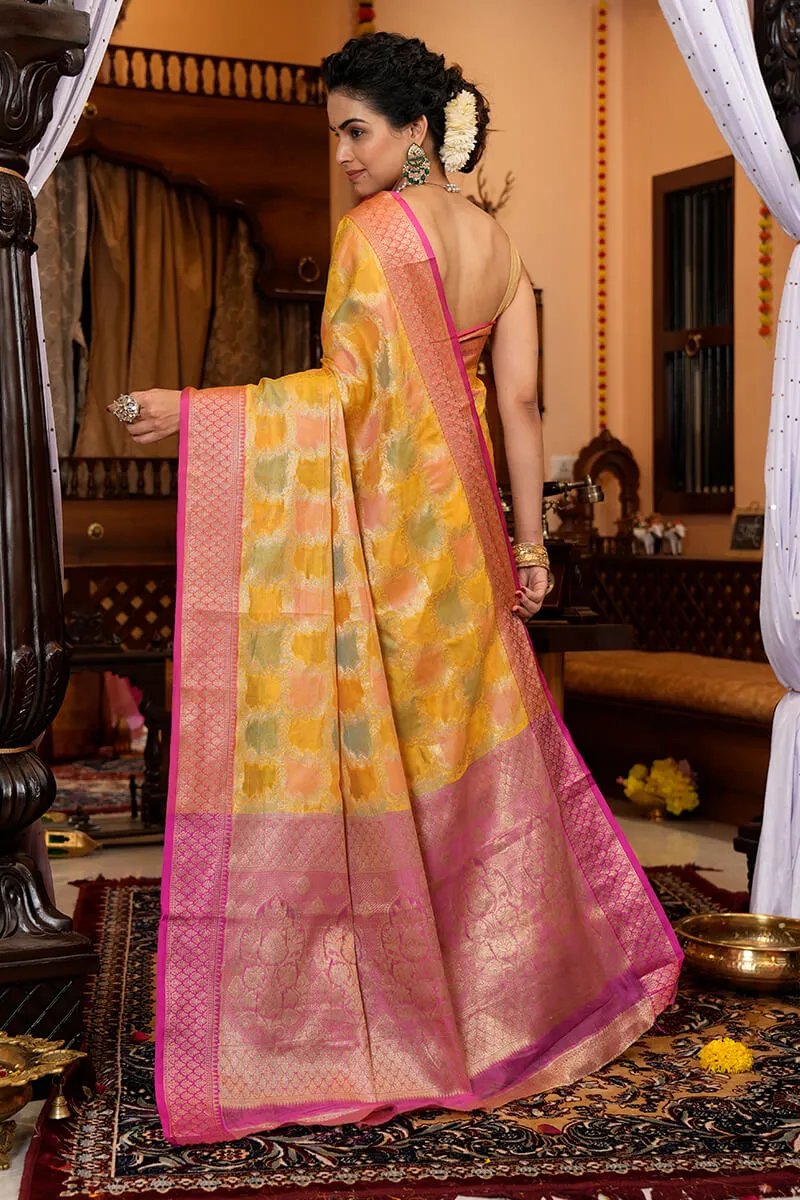 Pleasant Yellow Organza Silk Saree With Flameboyant Blouse Piece