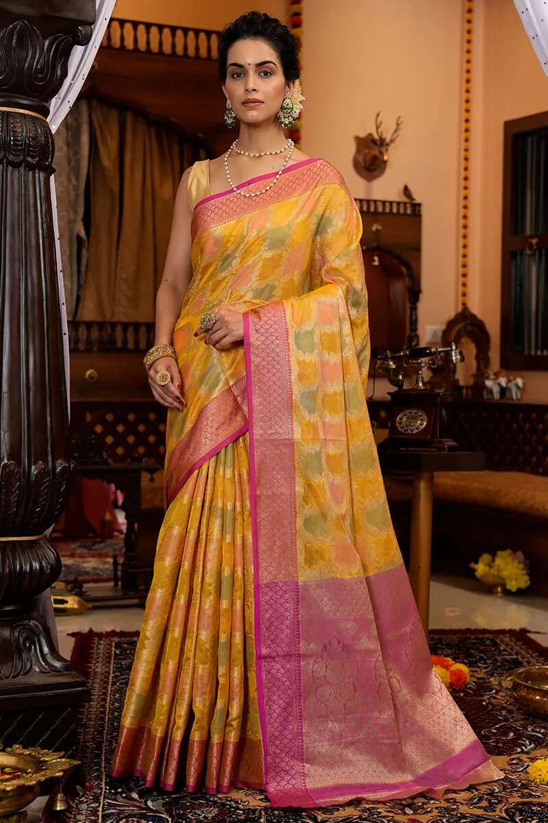 Pleasant Yellow Organza Silk Saree With Flameboyant Blouse Piece