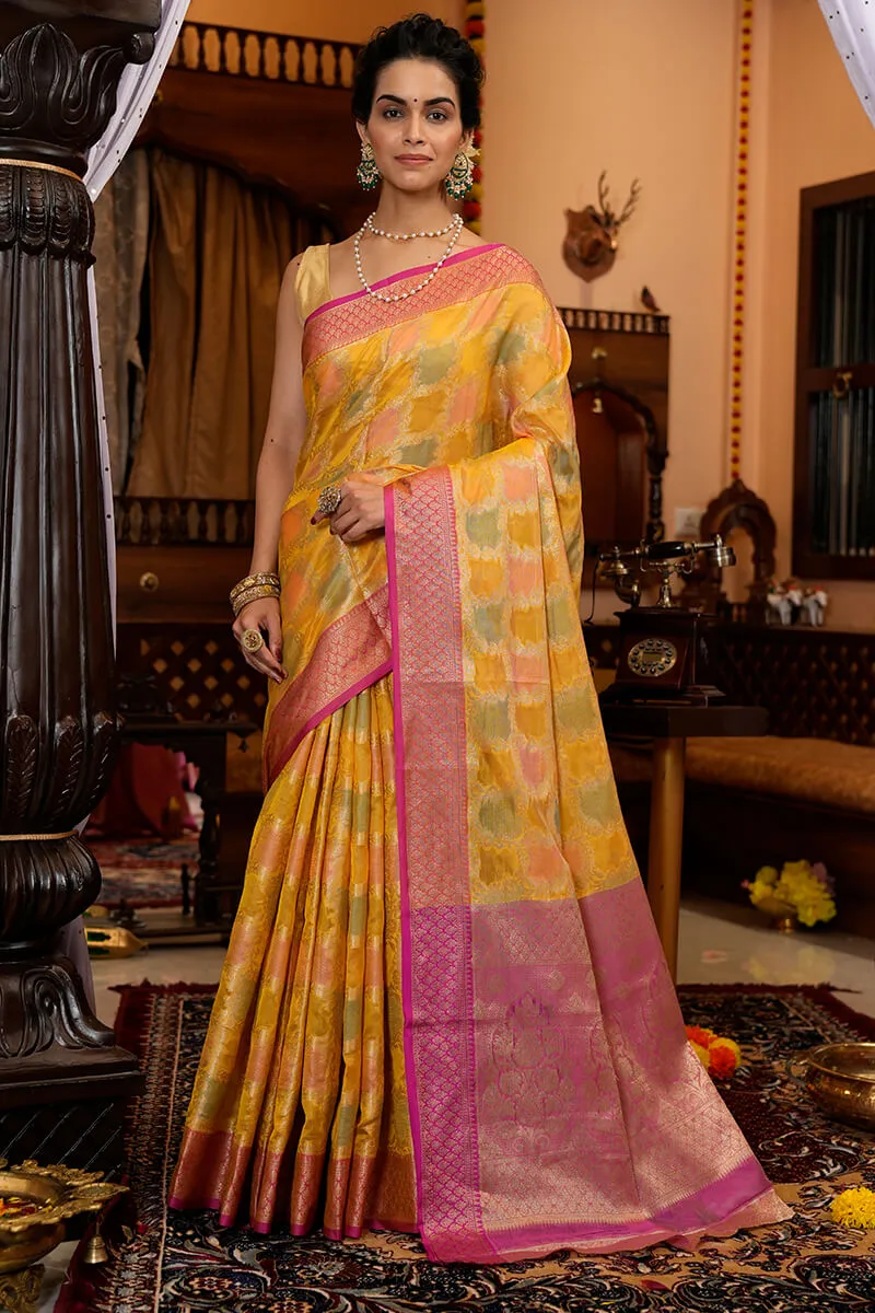 Pleasant Yellow Organza Silk Saree With Flameboyant Blouse Piece